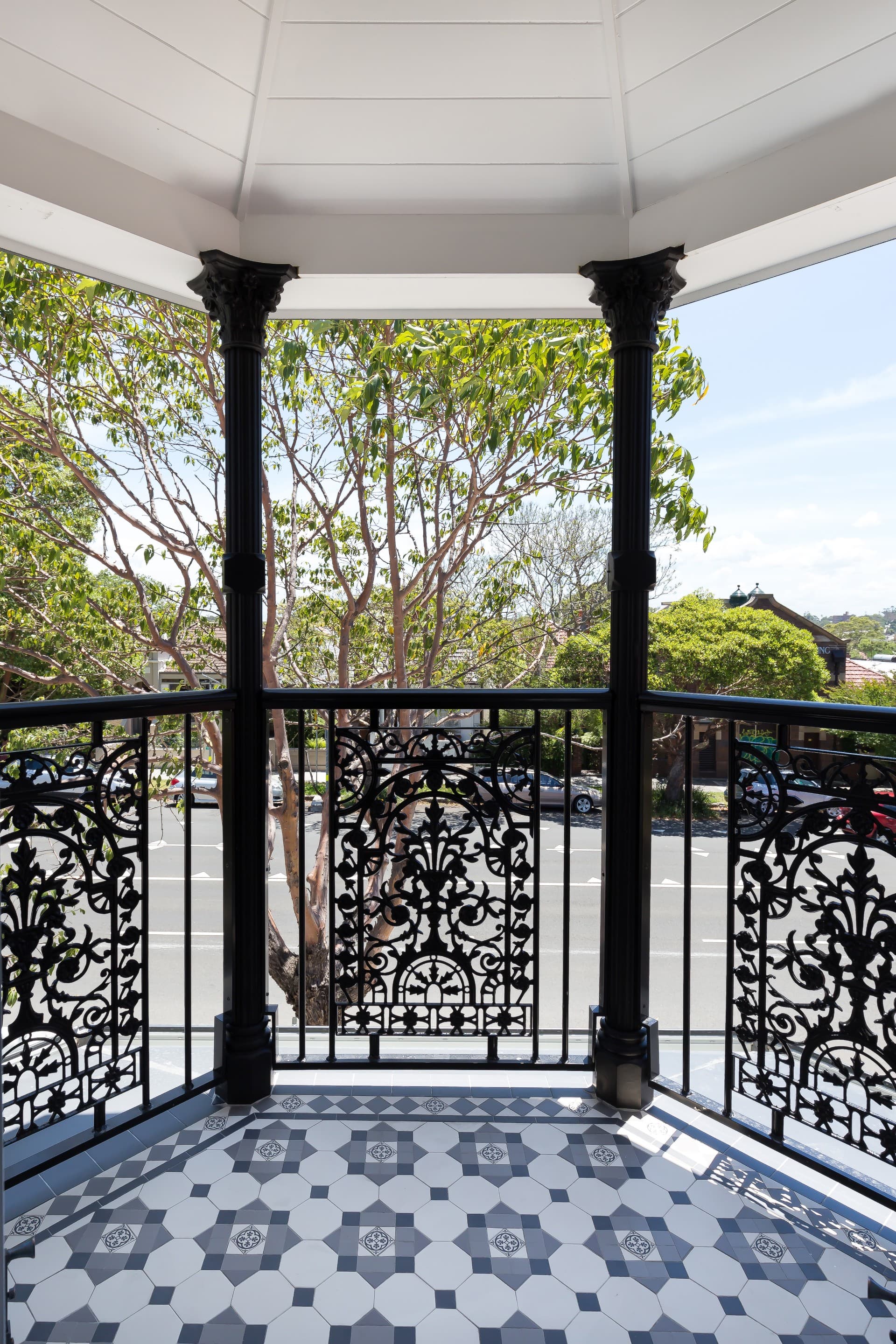 KBLCO outdoor renovation, Sydney. Turret balcony with iron lacework and tessellated tiles.