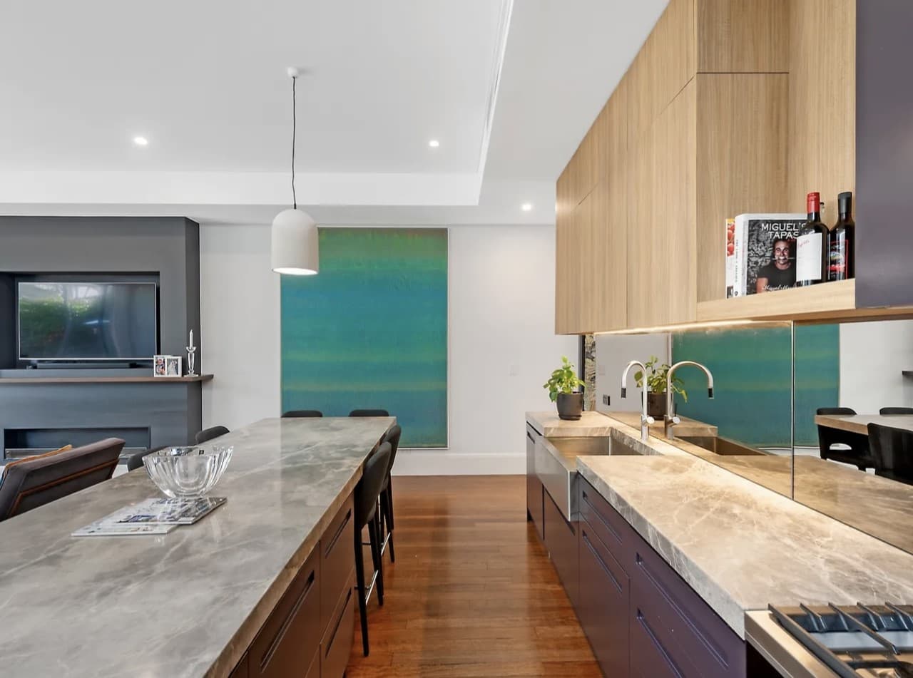 KBLCO kitchen renovation, Sydney. Compact galley with integrated appliances.