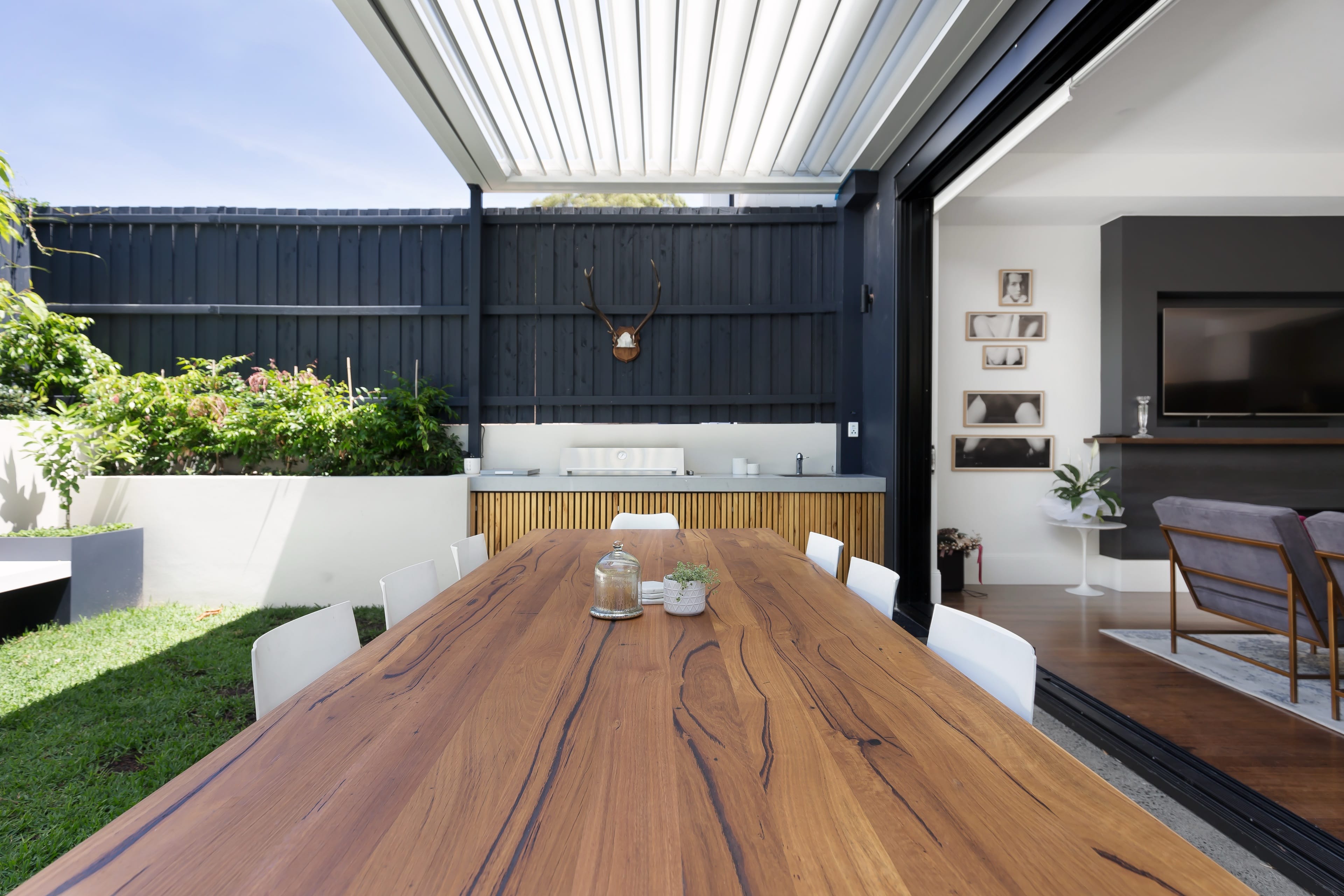 Johnston alfresco deck with a pergola.